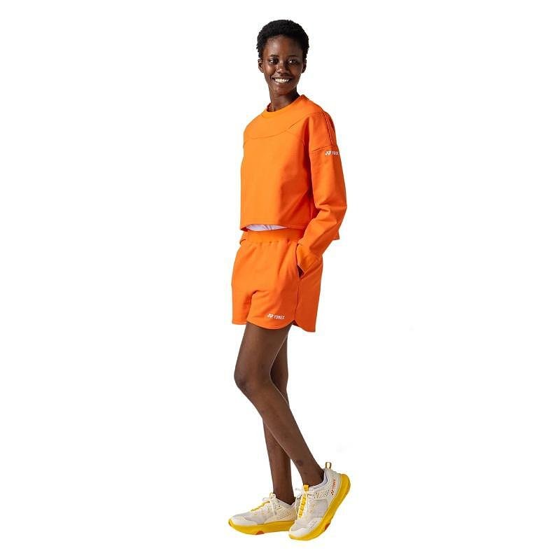 Дамски шорти Yonex 37009 Cyber Orange за тенис и бадминтон, стилни и удобни спортни шорти с модерен дизайн