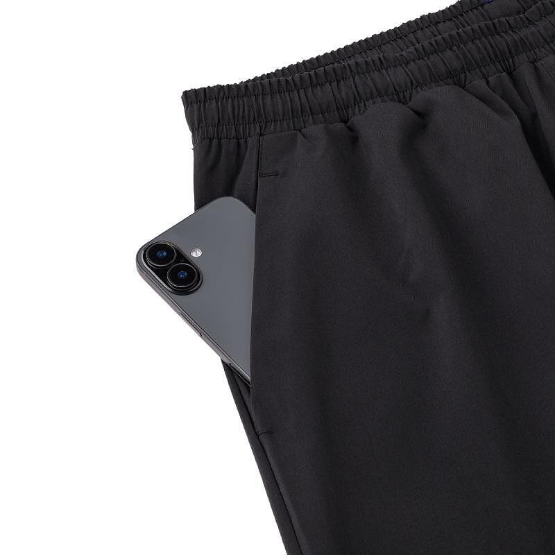 Yonex 60198 Unisex Black bottoms, black polyester sports bottoms for tennis and badminton, comfortable with a phone pocket