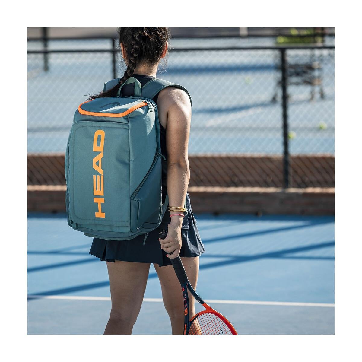Head Pro 28L Dark Cyan/Fluo Orange backpack for tennis and padel, stylish and functional Head backpack with a racquet compartment